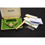 Avia ladies wristwatch, a Hick's gold metal prope
