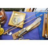 A machete in leather sheath, two arrow head bayonets, and a bullion embroidered military badge.