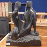 J R Brown, resin sculpture of two figures, signed