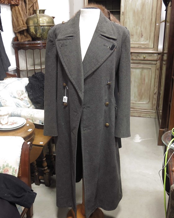 A grey military wool overcoat, and two military ja