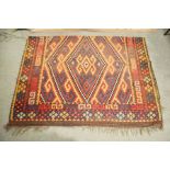 A Kelim style rug, geometric multi-coloured design