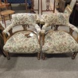 A pair of Victorian upholstered tub chairs, horses
