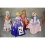 Four Royal Doulton figures of children, including