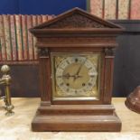 A 19th century oak cased bracket clock, Corinthian