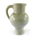Walter and Edwin Martin for Martin Brothers, a plain stoneware jug, 1892, inverse baluster form with