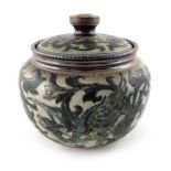 Robert Wallace Martin for Martin Brothers, a stoneware jar and cover, 1892, squat ovoid form,