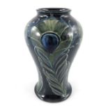 William Moorcroft, a Peacock Feather vase, circa 1918, inverse baluster form, impressed Burslem