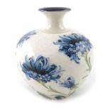 William Moorcroft for James MacIntyre, a Florian Ware blue Cornflower vase, circa 1903, ovoid form