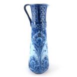 William Moorcroft for James MacIntyre, a Florian Ware Peacock jug, circa 1900, conical form with