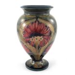 William Moorcroft for James MacIntyre, a Cornflower vase, circa 1913, footed ovoid form with everted