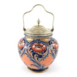 William Moorcroft for James MacIntyre, an Alhambra colourway Poppy biscuit barrel, circa 1902,