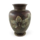 Edwin Martin for Martin Brothers, a stoneware vase, 1893, shouldered and footed ovoid form,
