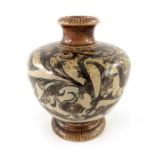 Edwin Martin for Martin Brothers, a small stoneware vase, 1886, footed ovoid form with narrow