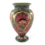 William Moorcroft for James MacIntyre, a Cornflower vase, 1913, footed ovoid form with everted