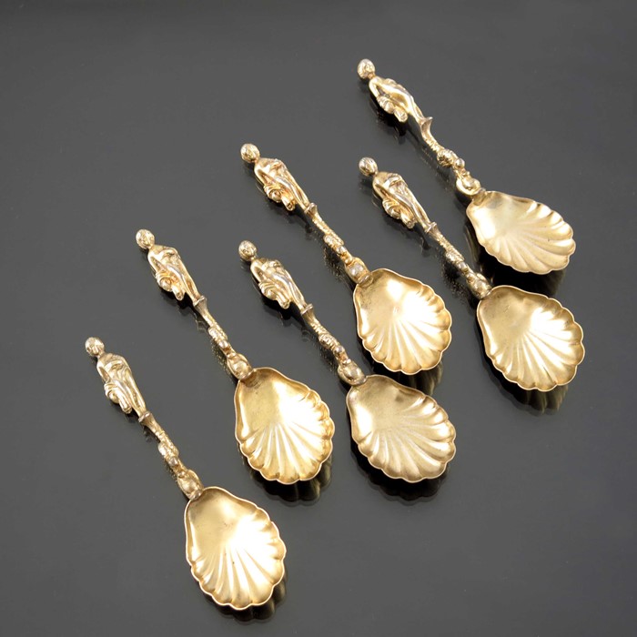 A set of six Renaissance Revival silver gilt figural salt spoons