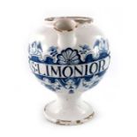 A London Delft wet drug jar, globular form on a spreading foot, loop handle and squat spout, circa 1