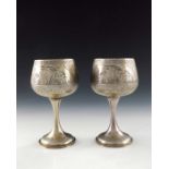 A pair of Aesthetic Movement silver gilt goblets, Charles Edwards, London 1880