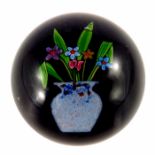 Paul Ysart, Monart vase with flowers paperweight on a black ground, Monart vase with aventurine spla