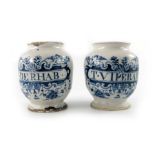 A pair of London Delft pill jars, ovoid form, circa 1730, one decorated in blue with a scrolling str