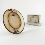 An Art Deco onyx and malachite desk calendar and a photo frame