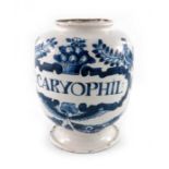 A London Delft drug jar, ovoid form, circa 1720, decorated in blue with a scrolling strapwork label