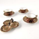 Three Royal Crown Derby miniature tea cups and saucers, Imari 2451