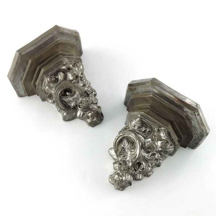 A pair of 19th Century stoneware, silver lustre and drabware wall brackets