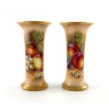 E Townsend for Royal Worcester, a pair of fruit painted vases