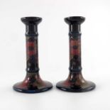 William Moorcroft, a pair of Pomegranate candlesticks