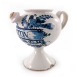 A Lambeth Delft wet drug jar, globular form on a spreading foot, loop handle and squat spout, circa