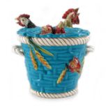A Minton Aesthetic Movement porcelain novelty basket and cover with cockerel heads, model 2048, 1876