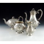 A Victorian Irish silver four piece tea set, West and Son, Dublin 1871 and 1873