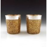 Stuart Devlin, a pair of Modernist silver and parcel gilt beakers, London 1978