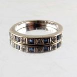 An 18 carat white gold diamond and sapphire half eternity ring