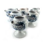 A set of six Newton Hall Delft wet drug jars, globular form on a spreading foot, loop handle and squ