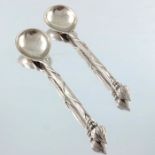 Omar Ramsden, a pair of Arts and Crafts silver long spoons, London 1934,