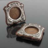 A pair of Arts and Crafts silver photo frames, Gourdel Vales and Co., Birmingham 1904