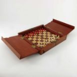 An Edwardian travelling chess set