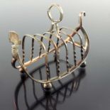 A novelty silver plated toast rack in the form of a gondola, Scott and Randle