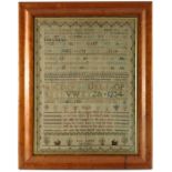 A 19th century alphabet sampler by Fanny Rodbard, aged 10, worked in cross stitch with rows of upper