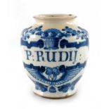 A London Delft pill jar, ovoid form, circa 1740, decorated in blue with a scrolling strapwork label