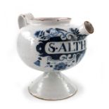 A London Delft wet drug jar, globular form on a spreading foot, loop handle and squat spout, circa 1