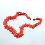 A string of graduated circular coral beads, together with a natural coral necklace