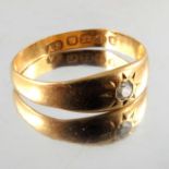 A 22 carat gold and diamond ring