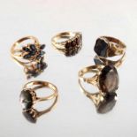 Five 9 carat gold gem set rings
