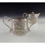 A Chinese Persian style white metal teapot and sugar bowl