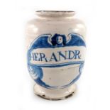 A Lambeth Delft drug jar, ovoid form, circa 1670, decorated in blue with a scrolling strapwork label