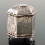 A Dutch white metal pot and cover