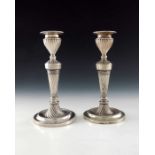 A pair of Victorian silver candlesticks, Hawksworth, Eyre and Co., Sheffield 1900,