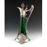 WMF, a Jugendstil silver plated and green glass claret jug